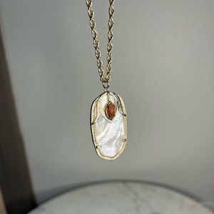 Long Kendra Scott Necklace with Large Dani pendant.